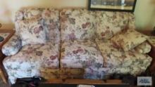 Cream colored with floral print sofa and chair made by England Incorporated