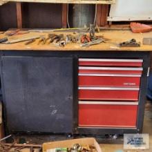 Craftsman workbench with hardware tools and accessories