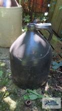 Dark brown pottery jug
