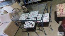 Wrought iron glass top outdoor table and four chairs