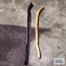 Two decorative wooden canes
