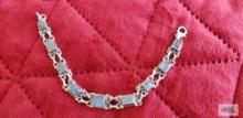Silver colored bracelet with blue colored stones marked 925 17.4 G (Description provided by seller)