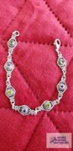 Silver color bracelet with colored stones marked 925 12.7 G (Description provided by seller)