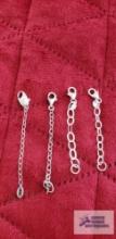 Four silver colored chain extenders, three marked 925, one marked 950 8.5 G (Description provided by
