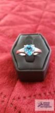 Silver colored ring with blue stone marked 925 3.3 G (Description provided by seller)
