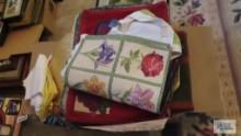 Assorted placemats and tablecloths
