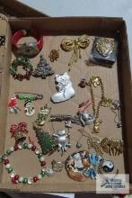 Lot of assorted decorative pins and watch