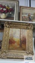 woods scene oil on canvas with ornate antique frame. Measures 25 in. by 22 in.
