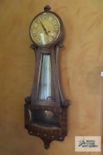 vintage wind up wall clock with key