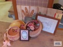 Miscellaneous decorative items, including baskets, pictures, hat, and comfort mat