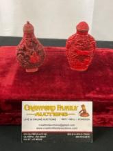 Pair of Finely Carved Red Chinese Cinnabar Lacquer Snuff Bottles