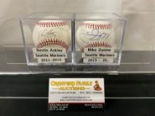 Pair of Handsigned Baseballs from Mariners Players, in acrylic case