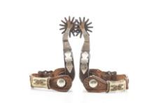 Pair of double mounted gal-leg Spurs, maker marked "JAX" with matching buckles. Spurs have hand engr