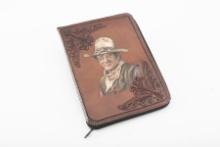 Beautifully hand tooled leather, zippered Folder, measures 13 1/2" x 10". Tooled on front is bust of