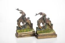 Exceptional pair of vintage metal bucking horse Book Ends made by Paul Herzel (1876-1956), near pris