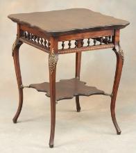 Fancy antique mahogany Lamp Table, circa 1910, with fancy stretcher, stick and ball skirt, cabriole