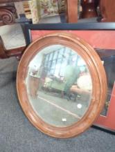 Victorian Style Oval Mirror in Oak, Approximate Dimensions - 22" x 19", Appears to have Some Minor