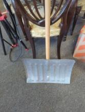 Metal Snow Shovel With Wood Handle, Measure Approximately 18 in x 45 in, Shows signs of aging What