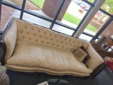 Victorian Style Deep Button Tufted Couch with Carved Wood, Cream Colored Cushions, Approximate
