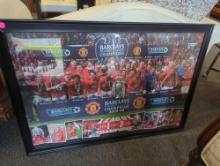 Framed Manchester United Barclays premier League champions 2008-09 poster. Black frame appears to be