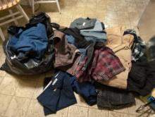 (LR) 2 LARGE BAGS OF MEN'S CLOTHING TO INCLUDE: JEANS, FLEECE ZIP UPS, SWEATERS, PLAID JACKET,