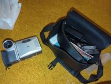(LR) SHARP VL-AH150 VIEW CAMERA, WITH CARRY CASE, CHARGER. AND TAPES.