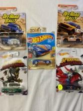 2 Matchbox Off-Road Collectible cars, 50 year anniversary collectible, and 2 Spider-Man
