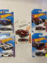 4 assorted Hot Wheels collectible cars, 1 Hot Wheels ID collectible car