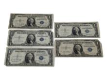 Lot of (5) 1935 $1 Blue seal silver certificate bank notes. Includes: (1) 1935D, (2) 1935E, (1)