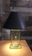 X FRAME GOLD-TONE TABLE LAMP