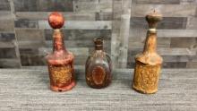3)  ITALIAN LEATHER WRAPPED DECANTERS