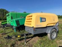 ATLAS COPCO 185 AIR COMPRESSOR powered by diesel engine, equipped with 185CFM, trailer mounted.