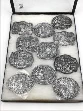 Collection of 11 Hesston Belt Buckles