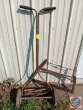 Antique LawnMower, Antique Wagon, and Antique Saw, and Antique Umbrella Stand