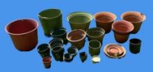 Assorted Plastic Flower Pots and Underplates
