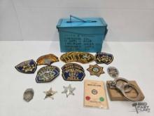 Blue Ammo Can with (19) Police Patches, (3) Sheriff Badges and more