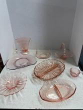 Pink depression, glass items, and one purple