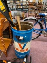 Valvoline oil can with two scrapers and an ax