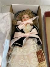 lot of vintage dolls including Precious Moments Christmas doll