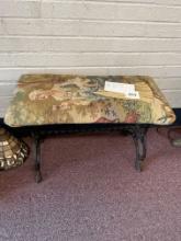 Cast iron fireside bench with lady fabric seat