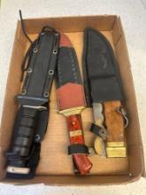 large Pakistan and China knives in casings