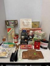 Vintage advertising items, including tins of thermometer, recipe boxes, buttons and more