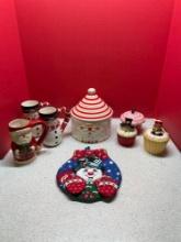 Christmas mugs, cookie jar, candles shaped like cupcakes and ceramic porcelain animal figure