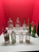 Vintage bottles, including milk bottles, 7-Up, Listerine more