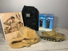 Mixed lot of a backpack, walkie-talkies, winter hat, tank, and photo of General Douglas MacArthur