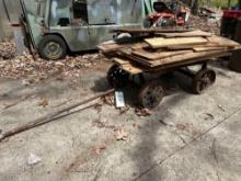 steel wheeled trolly cart with misc lumber
