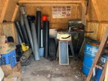 contents of shed - two barrels old racing fuel - Craftsman table saw - stack pipe
