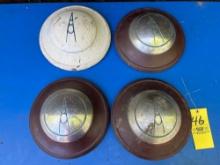 4 Early Ford hubcaps