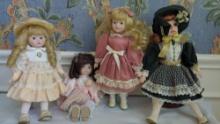 Lot of 4 Porcelain Dolls and 3 stands