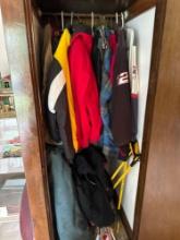 closet full of race jackets, and winter coats